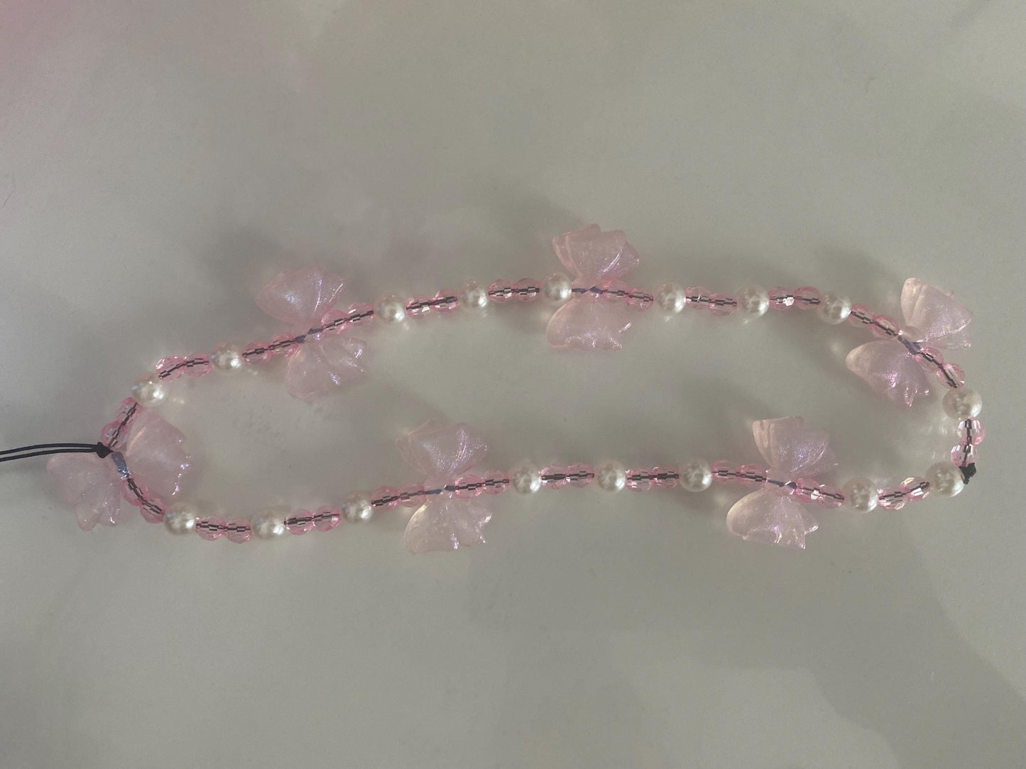 Pretty in Pink Bow Phone Charm – Handmade Beaded Wrist Strap with Pearls & Sparkle!